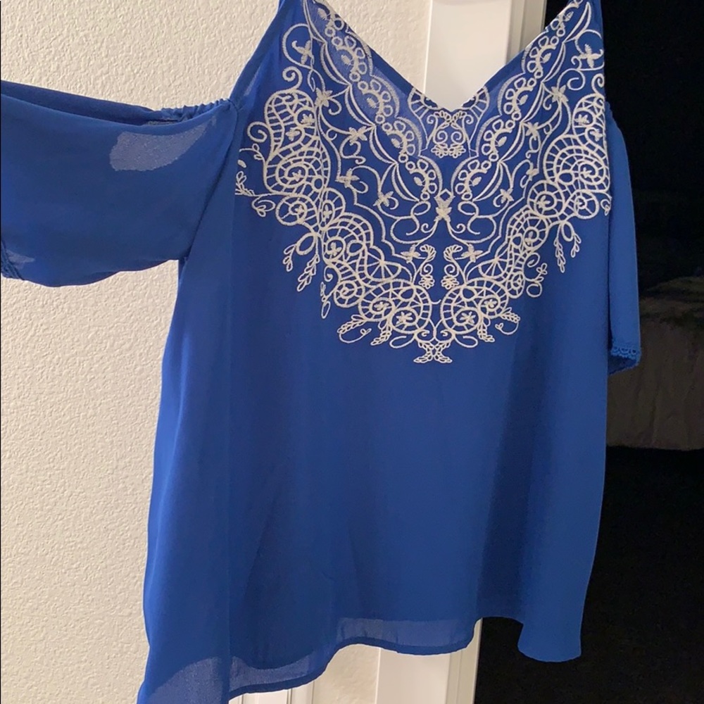 Silk top, new never been worn.